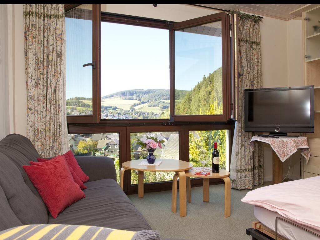 Апартаменты Cafe Alt Willingen Номер фото